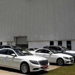 Different car models of Mercedes-Benz are parked at the company's vehicle assembly plant in Chakan, outside Pune.