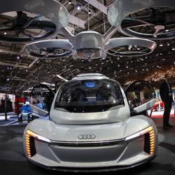 The Audi AG Pop.Up Next self-driving automobile and passenger drone concept vehicle on display at the 88th Geneva International Motor Show in Geneva, Switzerland, on Wednesday.