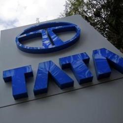 Tata Motors logos are seen at their flagship showroom in Mumbai February 14, 2013. REUTERS/Vivek Prakash/Files