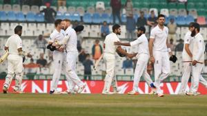 Players greet each other after India won the third Test match between India and England in Mohali on Tuesday.(PTI) Players greet each other after India won the third Test match between India and England in Mohali on Tuesday.(PTI)