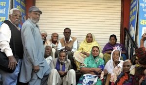 Senior citizens waiting for SBI branch to open to withdraw their pension in Indore on Thursday.(Arun Mondhe/HT photo)