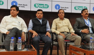 Virendra Kumar, regional manager of SBI, (far right) along with Varad Murti Mishra, additional collector, (second from left) addressing a press conference in Indore on Friday.(Shankar Mourya/HT photo)