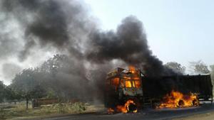 A dumper was burnt in Potka while a 10-wheel truck was set afire in Pipla during the dawn-to-dusk bandh on November 25.(HT File Photo) A dumper was burnt in Potka while a 10-wheel truck was set afire in Pipla during the dawn-to-dusk bandh on November 25.(HT File Photo)