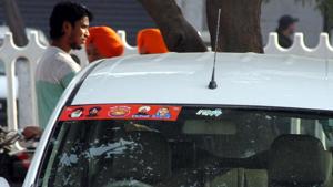 Political stickers pasted on vehicle in Ludhiana on Saturday.(JS Grewal /Hindustan Times) Political stickers pasted on vehicle in Ludhiana on Saturday.(JS Grewal /Hindustan Times)