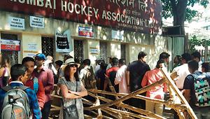 Fans queue up outside the Wankhede Stadium premises to pick up their tickets for the India vs England Test match that started in Mumbai on Thursday.(Hindustan times) Fans queue up outside the Wankhede Stadium premises to pick up their tickets for the India vs England Test match that started in Mumbai on Thursday.(Hindustan times)