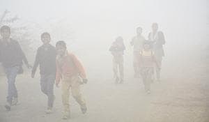 Children go to school amid dense fog in Dasna village near NH 24, Ghaziabad, on Friday.(Sakib Ali/HT Photo) Children go to school amid dense fog in Dasna village near NH 24, Ghaziabad, on Friday.(Sakib Ali/HT Photo)