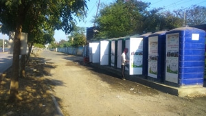 A man uses public toilet built by Indore Municipal Corporation near Bhawarkuwa area.(HT photo)
