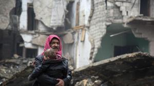 Syrians leave a rebel-held area of Aleppo towards the government-held side on December 13, 2016 during an operation by Syrian government forces to retake the embattled city.(AFP Photo) Syrians leave a rebel-held area of Aleppo towards the government-held side on December 13, 2016 during an operation by Syrian government forces to retake the embattled city.(AFP Photo)