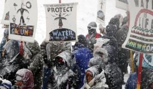 For months, people have camped on the now frozen plains of Standing Rock reservation to block the completion of the nearly $4 billion Dakota Access Pipeline. The remaining section of pipeline is supposed to pass under the Missouri River, close to the Standing Rock reservation. Indigenous activists claim it will endanger the local environment and violate the sanctity of their sacred lands(Reuters) For months, people have camped on the now frozen plains of Standing Rock reservation to block the completion of the nearly $4 billion Dakota Access Pipeline. The remaining section of pipeline is supposed to pass under the Missouri River, close to the Standing Rock reservation. Indigenous activists claim it will endanger the local environment and violate the sanctity of their sacred lands(Reuters)