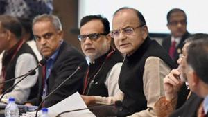 Union finance minister Arun Jaitley (centre) and revenue secretary Hasmukh Adhia (centre left) at a meeting in New Delhi earlier this month.(PTI File Photo) Union finance minister Arun Jaitley (centre) and revenue secretary Hasmukh Adhia (centre left) at a meeting in New Delhi earlier this month.(PTI File Photo)
