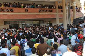 Congress activists protest at the collectorate in Indore on Friday.(Shankar Mourya/ HT photo)