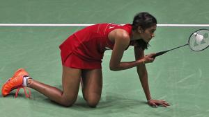 PV Sindhu reacts during her match against South Korea's Sung Ji-hyun during the World Superseries Finals Badminton tournament in Dubai on Saturday.(AP) PV Sindhu reacts during her match against South Korea's Sung Ji-hyun during the World Superseries Finals Badminton tournament in Dubai on Saturday.(AP)