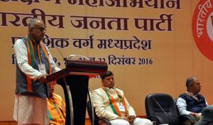 State BJP president Nand Kumar Singh Chouhan addressing the concluding session of training of the BJP state office bearers in Indore on Thursday.(Arun Mondhe/HT photo)