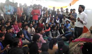 Students listen to a fellow participant at the ABVP’s conference in Indore on Sunday.(Arun Mondhe/HT)