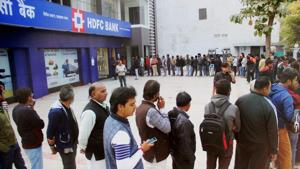 People stand in a queue to withdraw currency notes at an ATM in Allahabad . At last count 62 rule modifications had been made by the government and the Reserve Bank of India since demonetisation was announced.(PTI) People stand in a queue to withdraw currency notes at an ATM in Allahabad . At last count 62 rule modifications had been made by the government and the Reserve Bank of India since demonetisation was announced.(PTI)