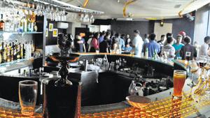 After a Christmas dampened by the note ban, residents are likely to prefer partying at home on New Year’s Eve too. Pub/bar owners say there has been a decline in bookings for events on December 31 night compared to the previous years.(HT File) After a Christmas dampened by the note ban, residents are likely to prefer partying at home on New Year’s Eve too. Pub/bar owners say there has been a decline in bookings for events on December 31 night compared to the previous years.(HT File)
