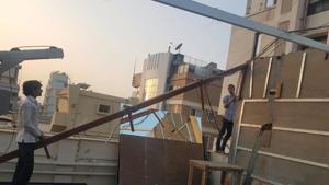 BMC officials reached actor Arjun Kapoor’s residence on Thursday where his staff was dismantling gym equipment and thereafter, demolished the structure.(HT photo) BMC officials reached actor Arjun Kapoor’s residence on Thursday where his staff was dismantling gym equipment and thereafter, demolished the structure.(HT photo)
