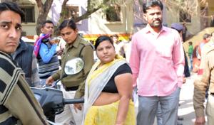 Corporation staffers managed to overpower the woman before she could attempt immolation.(Shankar Mourya/HT photo)