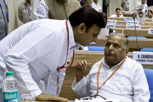 This file photograph taken in 2013 shows Uttar Pradesh chief minister Akhilesh Yadav (L) listening to his father Mulayam Singh at an event. In a country used to dynastic feuds, the battle between Akhilesh and his father Mulayam has been gripping stuff.(AFP Photo) This file photograph taken in 2013 shows Uttar Pradesh chief minister Akhilesh Yadav (L) listening to his father Mulayam Singh at an event. In a country used to dynastic feuds, the battle between Akhilesh and his father Mulayam has been gripping stuff.(AFP Photo)