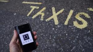 A photo illustration shows the Uber app logo displayed on a mobile.(Reuters) A photo illustration shows the Uber app logo displayed on a mobile.(Reuters)