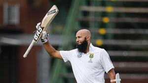 Hashim Amla became the second South African batsman to score a century in his 100th Test during the third game versus Sri Lanka in Johannesburg.(AFP) Hashim Amla became the second South African batsman to score a century in his 100th Test during the third game versus Sri Lanka in Johannesburg.(AFP)