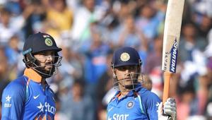 Mahendra Singh Dhoni and Yuvraj Singh struck big hundreds to carry struggling India to their second-highest ODI total against England in Cuttack on Thursday.(PTI) Mahendra Singh Dhoni and Yuvraj Singh struck big hundreds to carry struggling India to their second-highest ODI total against England in Cuttack on Thursday.(PTI)