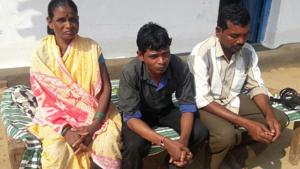 Sunil Uike (centre) with his mother and brother in Balaghat district on Saturday.(HT photo) Sunil Uike (centre) with his mother and brother in Balaghat district on Saturday.(HT photo)