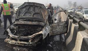 A Tata Indica car caught fire around 8.30 am at IFFCO Chowk. As per NHAI officials, the driver escaped unhurt.(Parveen Kumar/HT Photo) A Tata Indica car caught fire around 8.30 am at IFFCO Chowk. As per NHAI officials, the driver escaped unhurt.(Parveen Kumar/HT Photo)
