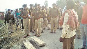 GRP personnel inspect the site after removing the two stone slabs placed on railway tracks.(HT photo) GRP personnel inspect the site after removing the two stone slabs placed on railway tracks.(HT photo)