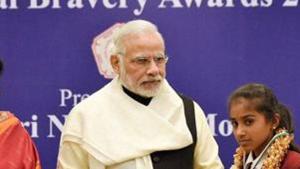 New Delhi: Prime Minister Narendra Modi presenting award at the National Bravery Awards 2016 function in New Delhi on Monday. Minister of State for Women and Child Development, Krishna Raj is also seen. PTI Photo (PTI1_23_2017_000278B)(PTI) New Delhi: Prime Minister Narendra Modi presenting award at the National Bravery Awards 2016 function in New Delhi on Monday. Minister of State for Women and Child Development, Krishna Raj is also seen. PTI Photo (PTI1_23_2017_000278B)(PTI)