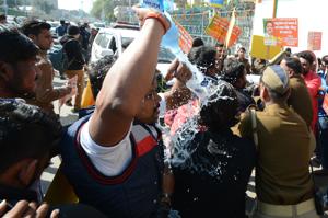 BJP workers stage protest over distribution of tickets to turncoats.(HT Photo) BJP workers stage protest over distribution of tickets to turncoats.(HT Photo)