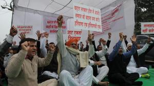 More than 50 members of the community assembled in a tent at a market-area next to Atul Kataria Chowk, and raised anti-government slogans holding placards.(Parveen Kuamr/HT Photo) More than 50 members of the community assembled in a tent at a market-area next to Atul Kataria Chowk, and raised anti-government slogans holding placards.(Parveen Kuamr/HT Photo)