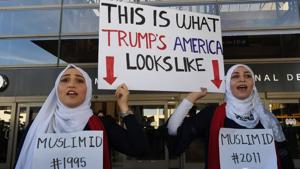 Noor Hindi (L) and Sham Najjar (R) who were born in the US of Syrian parents, demonstrate against the immigration ban imposed by US President Trump at the Los Angeles International Airport, California. India’s citizenship amendment bill openly discriminates against Muslim immigrants from the three specified countries.(AFP) Noor Hindi (L) and Sham Najjar (R) who were born in the US of Syrian parents, demonstrate against the immigration ban imposed by US President Trump at the Los Angeles International Airport, California. India’s citizenship amendment bill openly discriminates against Muslim immigrants from the three specified countries.(AFP)