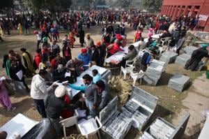 Polling officials collect electronic voting machines (EVM) at a distribution centre in Dera Bassi in Punjab on Friday on the eve of the state assembly elections.(REUTERS) Polling officials collect electronic voting machines (EVM) at a distribution centre in Dera Bassi in Punjab on Friday on the eve of the state assembly elections.(REUTERS)