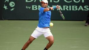 India's Yuki Bhambri returns a shot during his Davis Cup singles match against New Zealand's Finn Tearney at the Balewadi Sports Complex in Pune.(AFP) India's Yuki Bhambri returns a shot during his Davis Cup singles match against New Zealand's Finn Tearney at the Balewadi Sports Complex in Pune.(AFP)