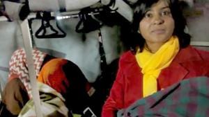 Chariperson of Rajasthan State Commission for Protection of Child Rights Manan Chaturvedi (in red coat) with the newborn baby.(Video grab) Chariperson of Rajasthan State Commission for Protection of Child Rights Manan Chaturvedi (in red coat) with the newborn baby.(Video grab)