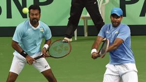 Leander Paes (left) and Vishnu Vardhan during India’s Davis Cup doubles match against New Zealand's Artem Sitak and Michael Venus in Pune on Saturday.(AFP) Leander Paes (left) and Vishnu Vardhan during India’s Davis Cup doubles match against New Zealand's Artem Sitak and Michael Venus in Pune on Saturday.(AFP)