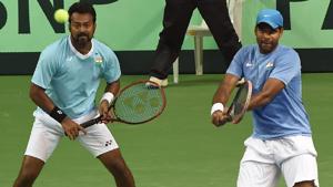 India's Leander Paes (L) and Vishnu Vardhan (R) compete in the Davis Cup doubles tennis match against New Zealand's Artem Sitak and Michael Venus.(AFP) India's Leander Paes (L) and Vishnu Vardhan (R) compete in the Davis Cup doubles tennis match against New Zealand's Artem Sitak and Michael Venus.(AFP)