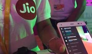 A Reliance employee demonstrates Jio LYF phone at their headquarters on the outskirts of Mumbai.(REUTERS) A Reliance employee demonstrates Jio LYF phone at their headquarters on the outskirts of Mumbai.(REUTERS)