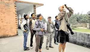 Two Czech tourists at the breeding site of greater adjutants at Kadwa diara in Bhagalpur district of Bihar.(HT PHOTO) Two Czech tourists at the breeding site of greater adjutants at Kadwa diara in Bhagalpur district of Bihar.(HT PHOTO)