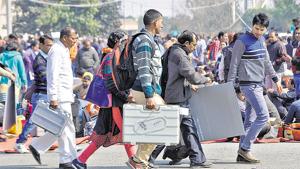 Block level officers carry electronic voting machines to their respective booths in Gautam Budh Nagar on Friday.(Sunil Ghosh/HT Photo) Block level officers carry electronic voting machines to their respective booths in Gautam Budh Nagar on Friday.(Sunil Ghosh/HT Photo)