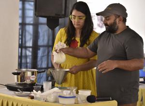 Dr Aditya Raghavan demonstrates his cheese-making skills at the cheese appreciation workshop during Hindustan Times Kala Ghoda Art Festival on Friday.(Arijit Sen/HT PHOTO) Dr Aditya Raghavan demonstrates his cheese-making skills at the cheese appreciation workshop during Hindustan Times Kala Ghoda Art Festival on Friday.(Arijit Sen/HT PHOTO)