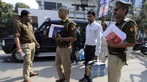 Noida police officers come out after sealing the sector 2 office of Webwork Trade Links Pvt Limited — an online social trading company that is being investigated for allegedly duping thousands of investors — on Wednesday.(Sunil Ghosh/ HT photo) Noida police officers come out after sealing the sector 2 office of Webwork Trade Links Pvt Limited — an online social trading company that is being investigated for allegedly duping thousands of investors — on Wednesday.(Sunil Ghosh/ HT photo)