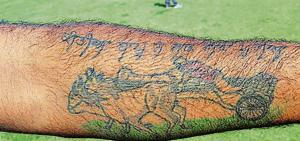 Satinder Singh , a bullock cart lover and jockey, got his arm tattooed with picture of bullock cart on the inaugural day of Kila Raipur Rural Sports Festival at village Kila Raipur in Ludhiana on Friday.(Gurminder Singh/Hindustan Times) Satinder Singh , a bullock cart lover and jockey, got his arm tattooed with picture of bullock cart on the inaugural day of Kila Raipur Rural Sports Festival at village Kila Raipur in Ludhiana on Friday.(Gurminder Singh/Hindustan Times)