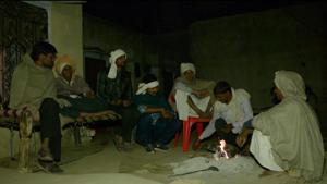 Villagers in Alwar’s Sili Baodi take turn in guarding against a ‘killer’ leopard. In this picture, men sit near a fire at Chhotelal Meena’s house. A leopard is suspected to have killed Meena’s father on Feb 12.(HT Photo) Villagers in Alwar’s Sili Baodi take turn in guarding against a ‘killer’ leopard. In this picture, men sit near a fire at Chhotelal Meena’s house. A leopard is suspected to have killed Meena’s father on Feb 12.(HT Photo)