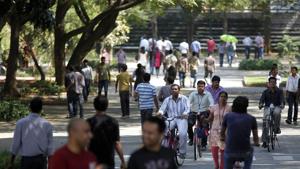 In this file photo, Infosys Technologies employees move through the headquarters during a break in Bangalore. Senior IT industry leaders claim any curb on H-1B visa by the Donald Trump administration will severely impact the US economy.(AP /For representational purpose only) In this file photo, Infosys Technologies employees move through the headquarters during a break in Bangalore. Senior IT industry leaders claim any curb on H-1B visa by the Donald Trump administration will severely impact the US economy.(AP /For representational purpose only)