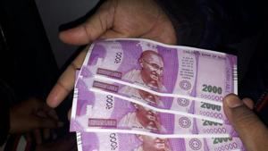 The poor security allows cash loaders to use the ATMs whenever they want, without any monitoring. This, experts say, indicates that crises such as the recovery of five fake Rs 2,000 notes disasters waiting to happen.(PTI) The poor security allows cash loaders to use the ATMs whenever they want, without any monitoring. This, experts say, indicates that crises such as the recovery of five fake Rs 2,000 notes disasters waiting to happen.(PTI)