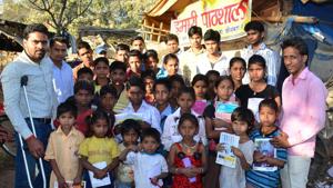 AU student Rajneesh Dubey (extreme left) along with slum kids here in Alopibagh on Monday.(Anil Kumar Maurya/ HT Photo) AU student Rajneesh Dubey (extreme left) along with slum kids here in Alopibagh on Monday.(Anil Kumar Maurya/ HT Photo)