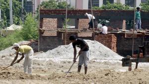 Under Building and Other Construction Workers Board scheme, only one family member can claim benefits.(HT File Photo) Under Building and Other Construction Workers Board scheme, only one family member can claim benefits.(HT File Photo)