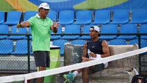 This file photo taken on August 1, 2016 shows Rafael Nadal of Spain listening to his coach and uncle Toni Nadal during a practice session at the Olympic park in Rio de Janeiro.(AFP) This file photo taken on August 1, 2016 shows Rafael Nadal of Spain listening to his coach and uncle Toni Nadal during a practice session at the Olympic park in Rio de Janeiro.(AFP)